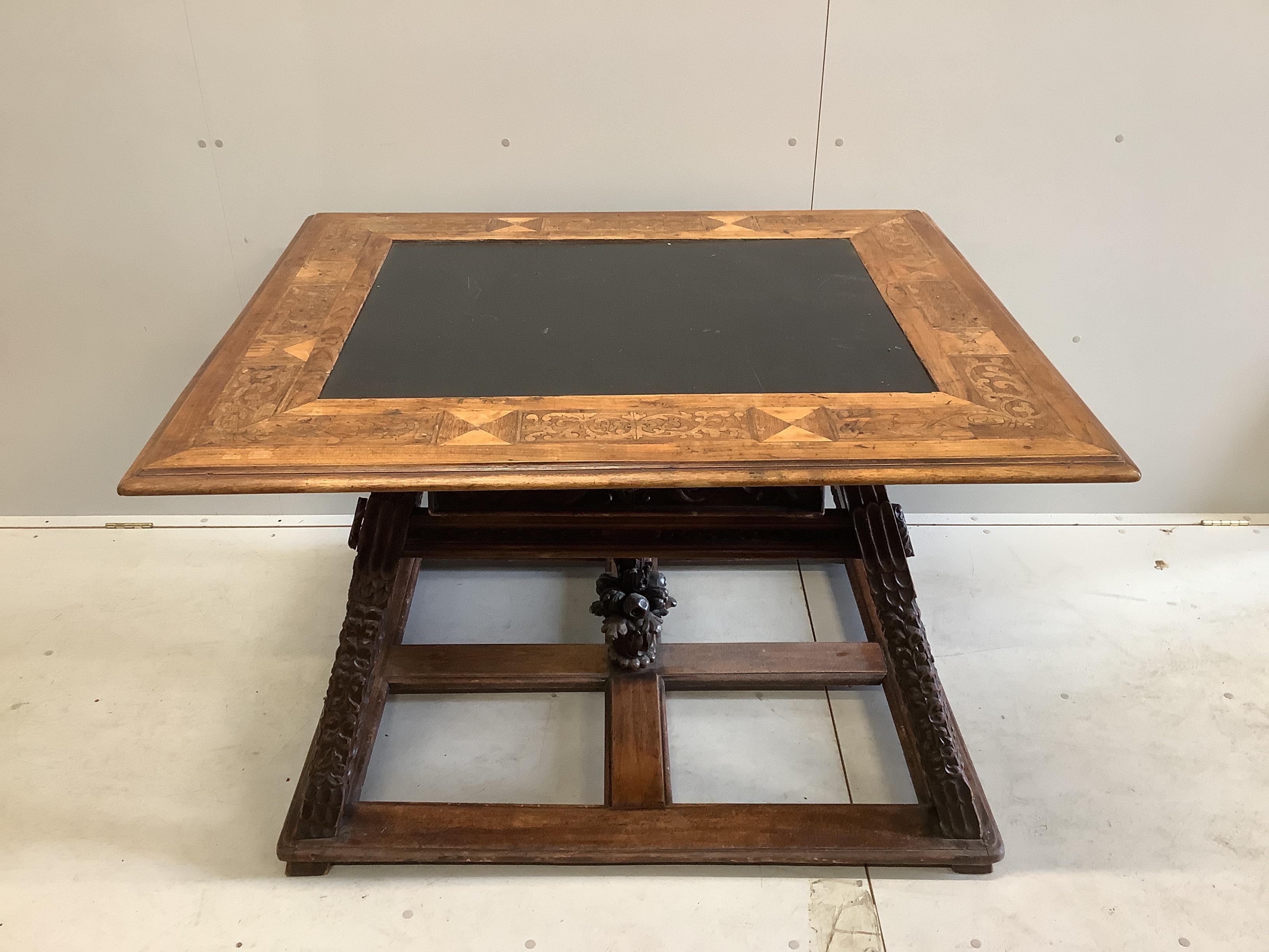 An Italian marquetry inlaid rectangular walnut slate top centre table, width 123cm, depth 104cm, height 79cm